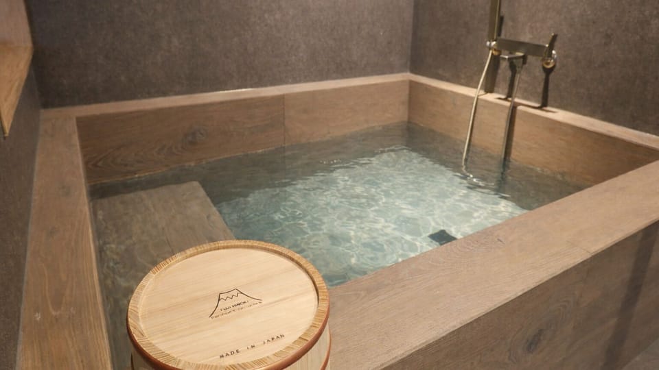 Japanese-style Suite, Non Smoking, Mountain View | Bathroom | Hair dryer, bathrobes, slippers, towels