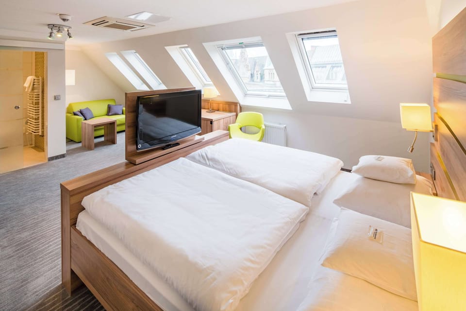 Deluxe Room, 1 King Bed (Converts to 2 Twin Beds;Larger Room) | Minibar, in-room safe, soundproofing, free WiFi