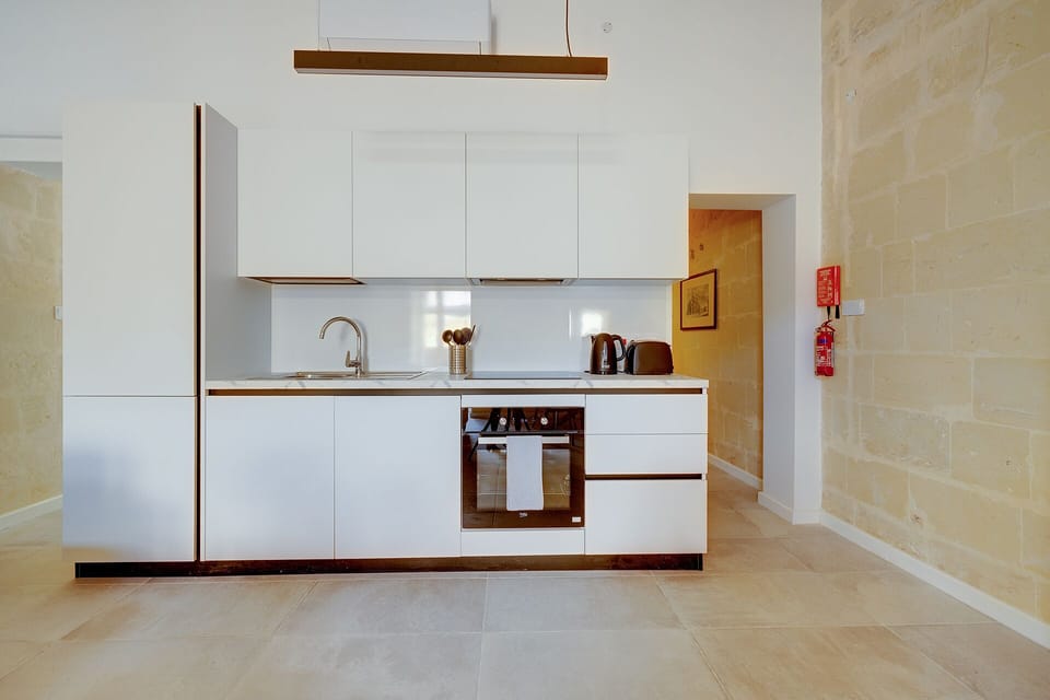 Apartment (2 Bedrooms) | Private kitchen | Microwave, espresso maker, electric kettle, toaster