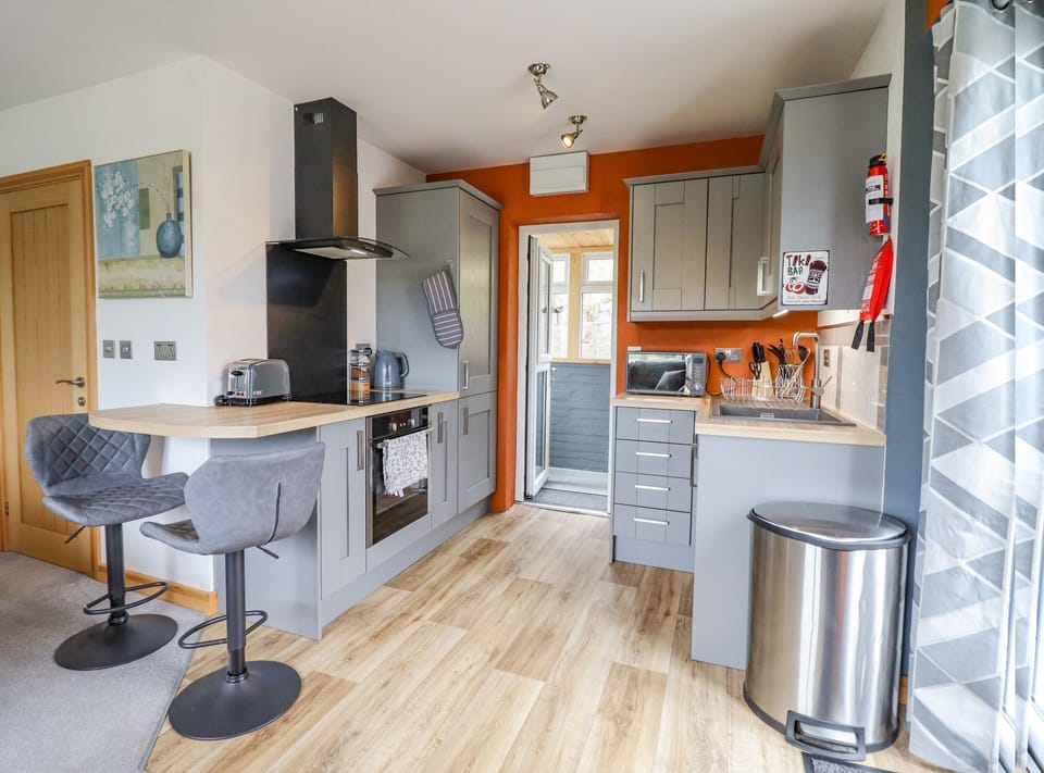 Fridge, electric kettle, toaster, cookware/dishes/utensils