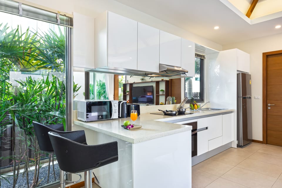 Luxury Villa | Private kitchen | Fridge, microwave, stovetop, dishwasher