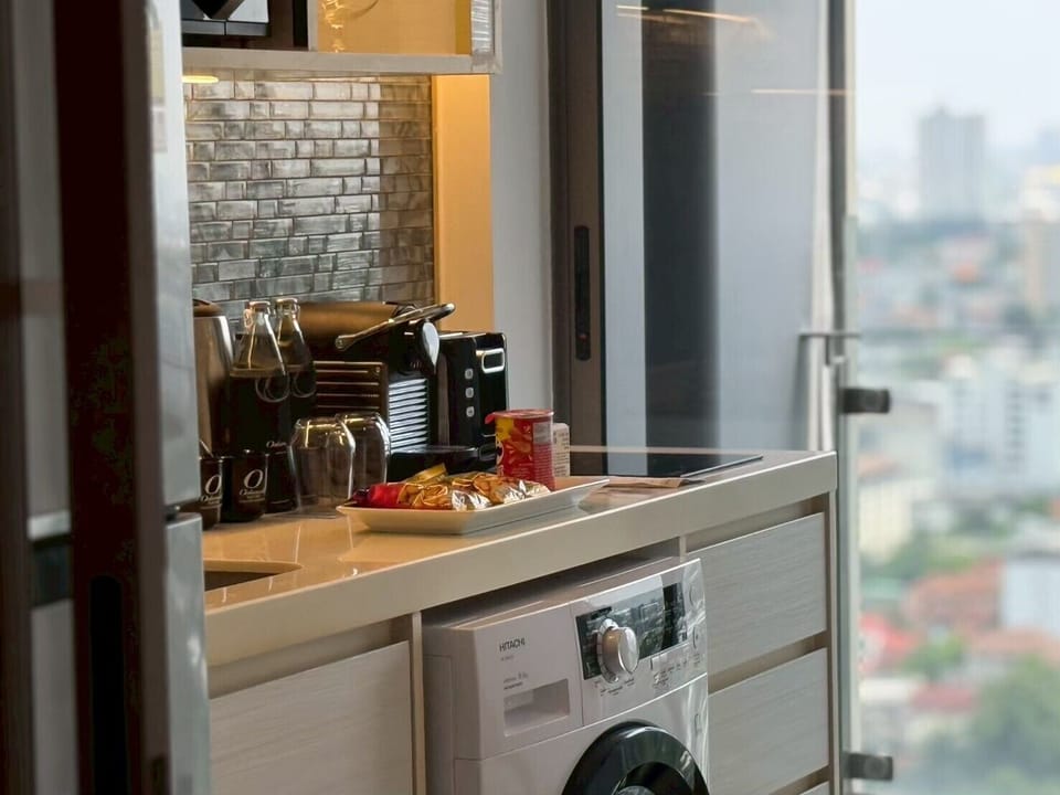 One Bedroom Deluxe  Sky View King | Private kitchen | Full-size fridge, microwave, stovetop, dishwasher