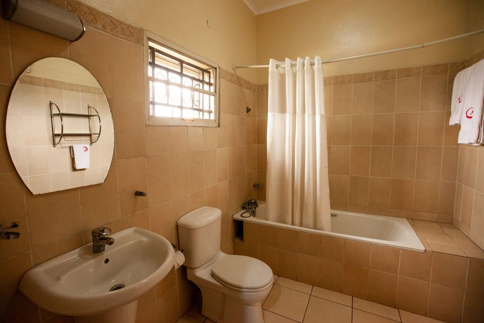Executive Double or Twin Room | Bathroom | Combined shower/tub, deep soaking tub, rainfall showerhead