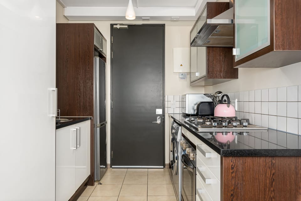 Exclusive Studio Suite | Private kitchen | Fridge, microwave, oven, stovetop