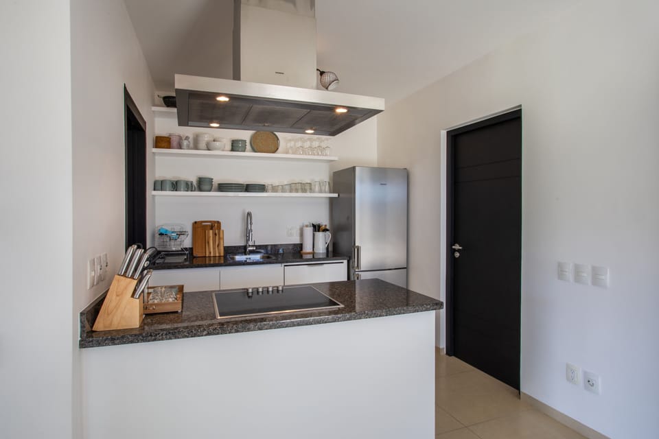 Comfort Apartment | Private kitchen | Full-size fridge, oven, stovetop, dishwasher
