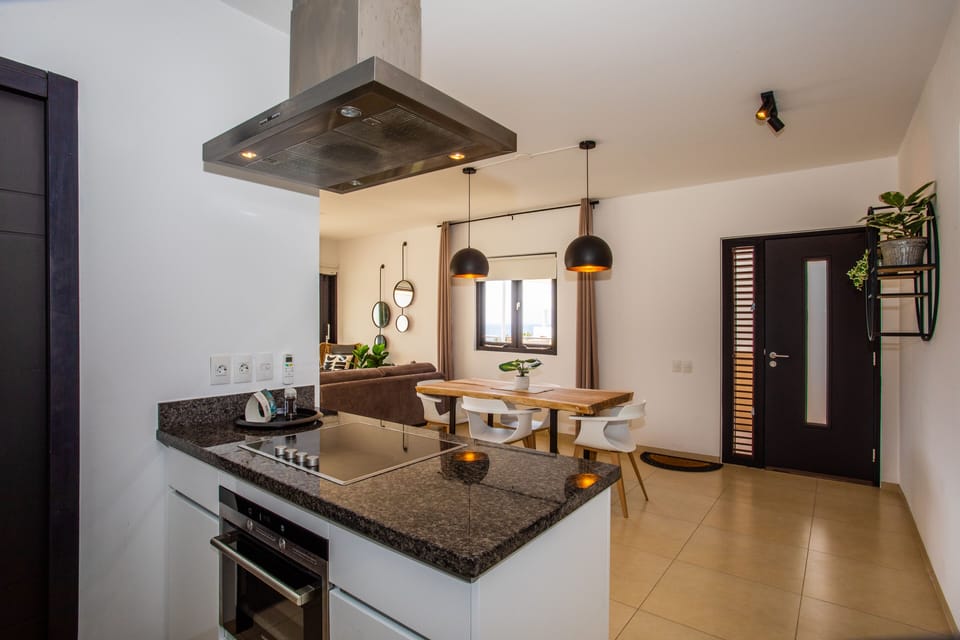 Comfort Apartment | Private kitchen | Full-size fridge, oven, stovetop, dishwasher