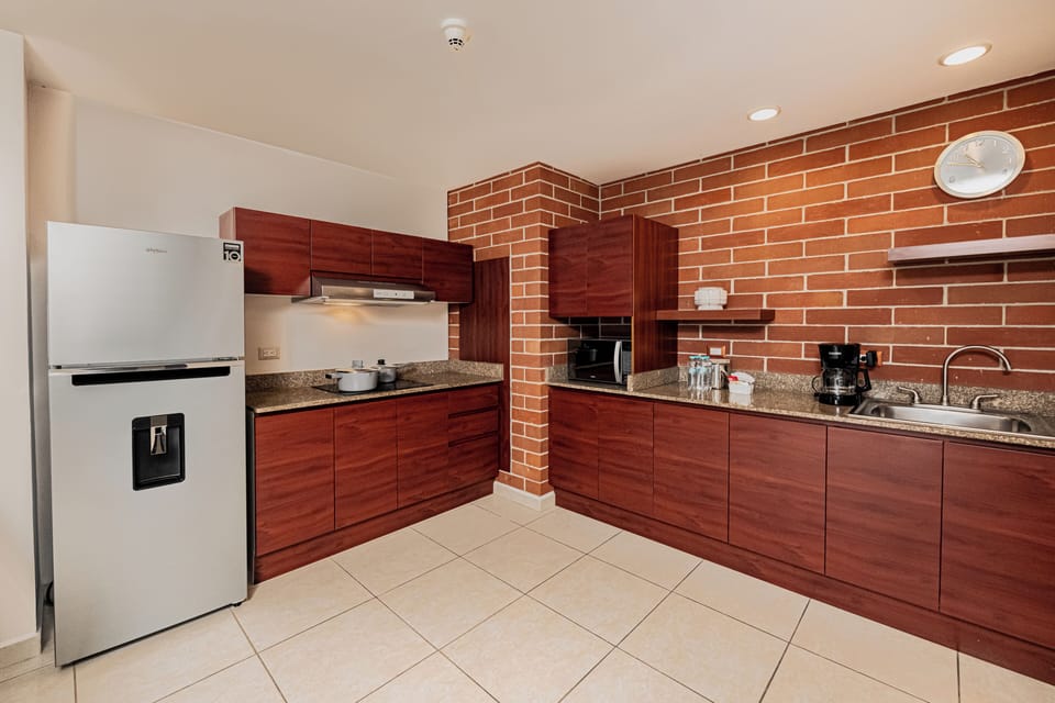 Family Suite, 2 Bedrooms, Kitchenette, City View (1 King Bed & 2 Twin Beds) | Private kitchen | Coffee/tea maker