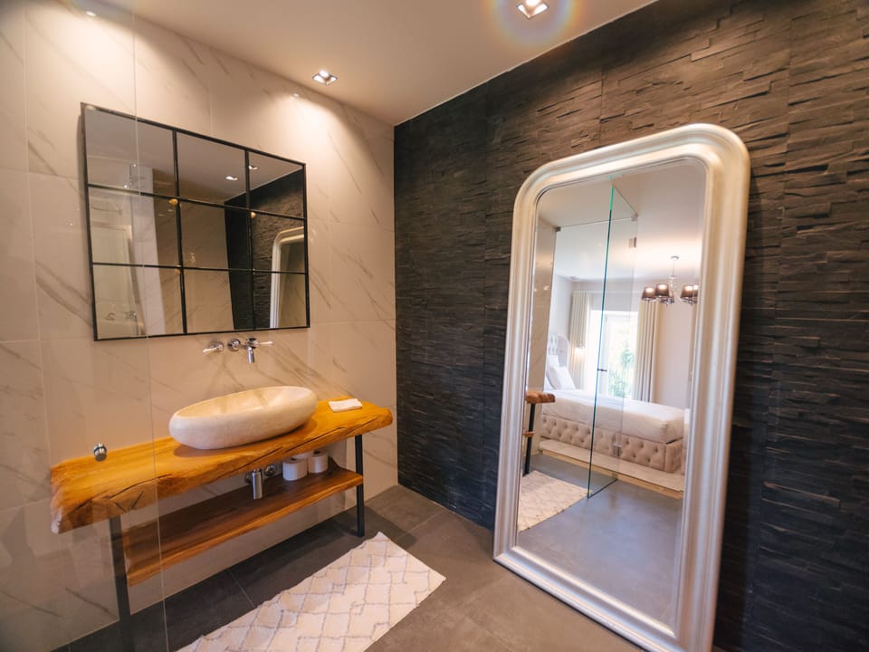 Family Quadruple Room, 2 Queen Beds | Bathroom | Shower, rainfall showerhead, hair dryer, towels