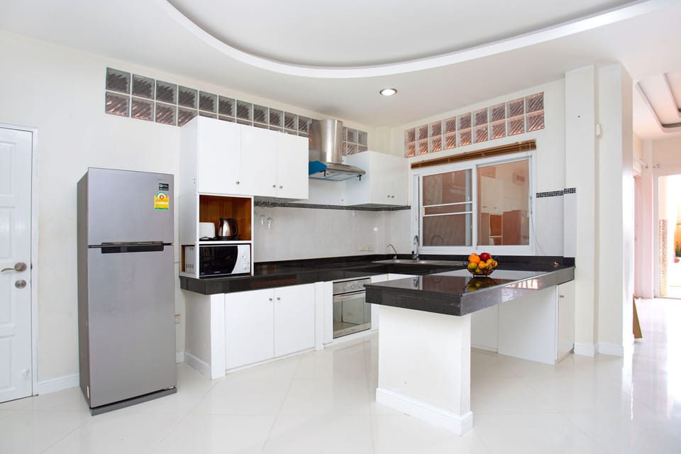 Elite Villa | Private kitchen | Fridge, microwave, oven, stovetop