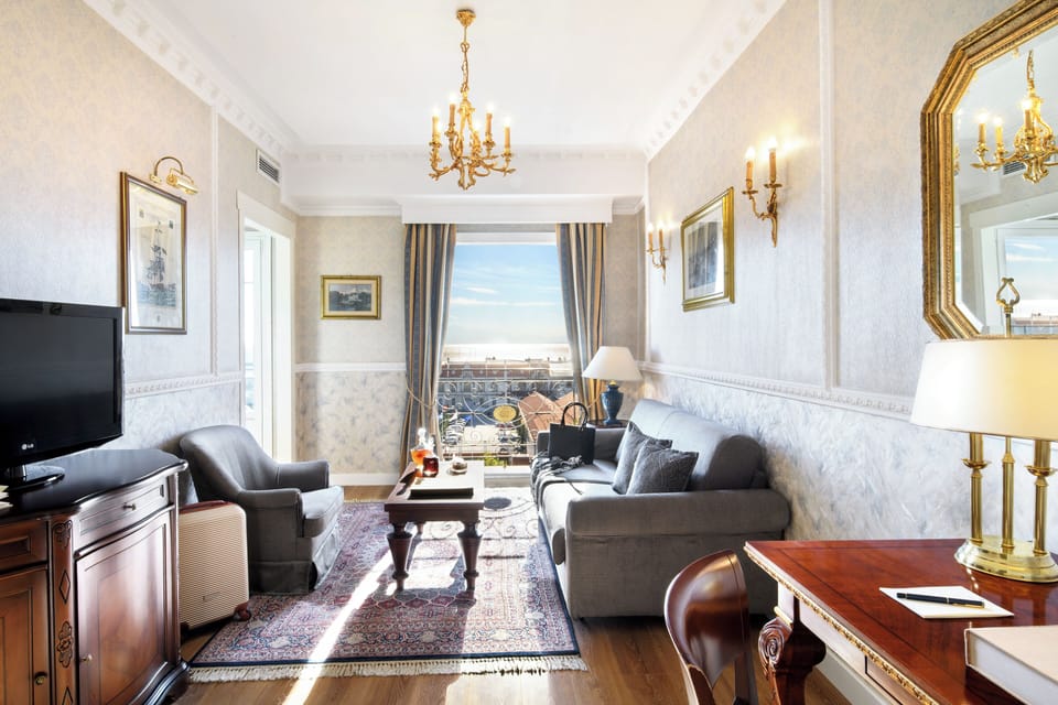 Superior Suite | Living area | 32-inch Smart TV with satellite channels