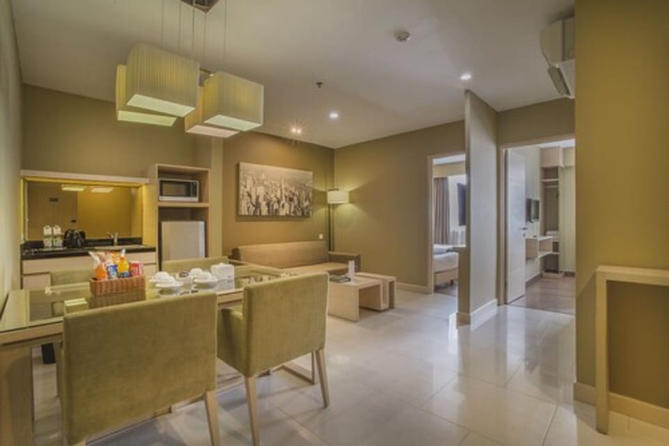 Junior Suite, 2 Bedrooms | Minibar, in-room safe, desk, laptop workspace