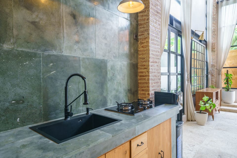 Design Villa, 1 Bedroom | Private kitchen | Full-size fridge, stovetop, cookware/dishes/utensils, dining tables