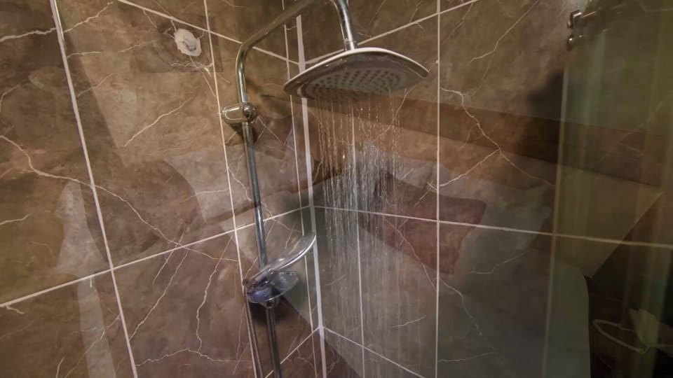 Rainfall showerhead, free toiletries, hair dryer, slippers