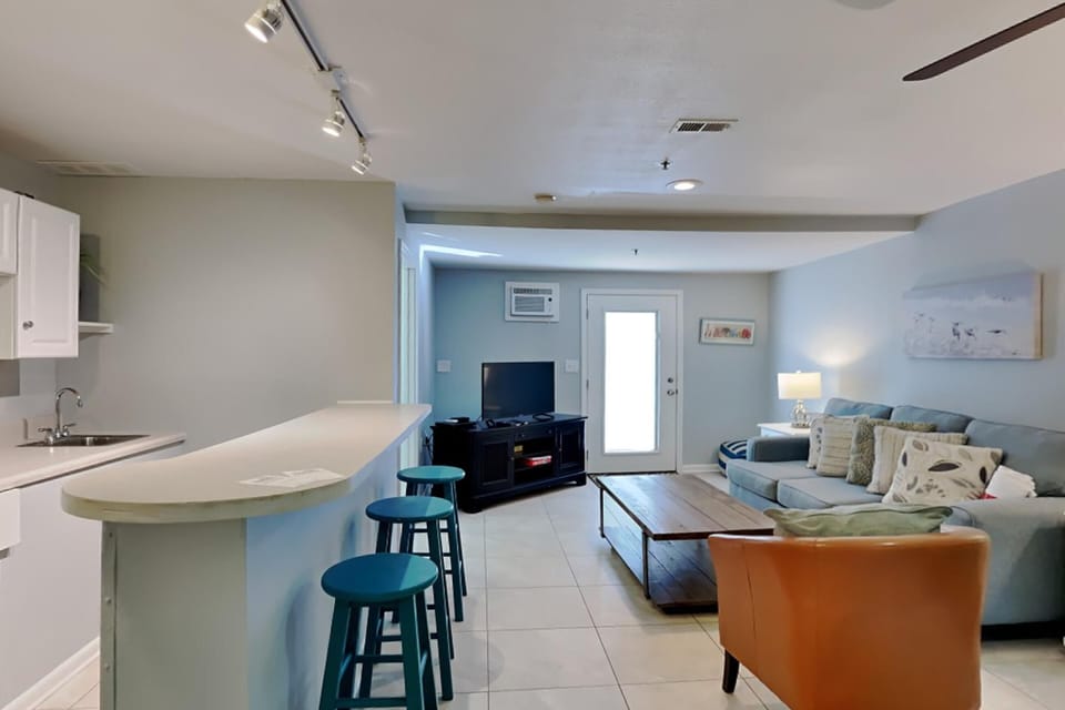 Condo, Multiple Beds, Balcony, Ocean View | Living area | TV