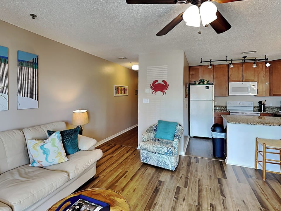 Condo, Multiple Beds, Balcony, Partial Sea View | Living area | TV