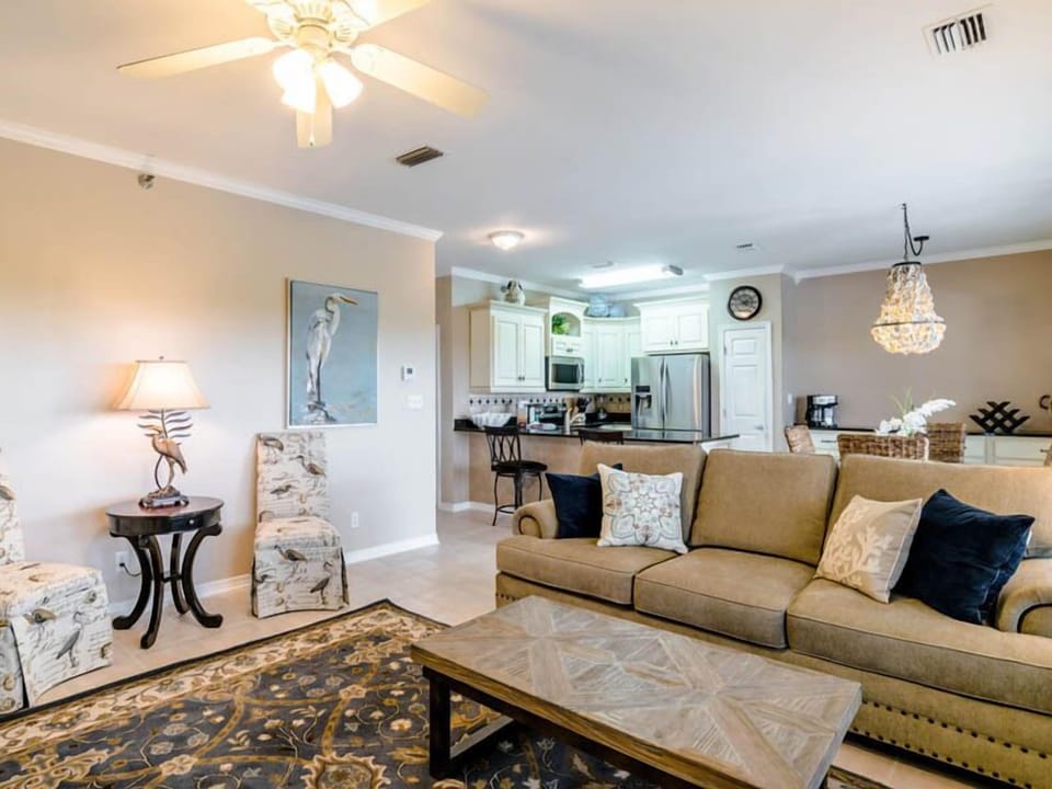 Condo, Multiple Beds, Balcony | Living area | TV, MP3 dock