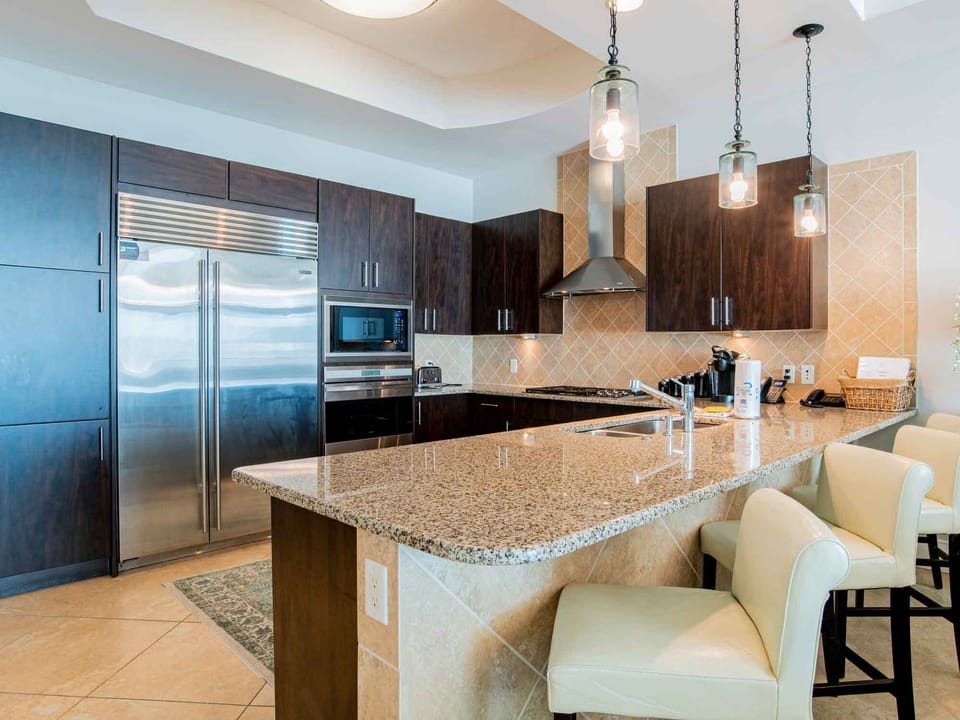 Condo, Multiple Beds, Balcony, Ocean View | Private kitchen | Fridge, microwave, oven, stovetop