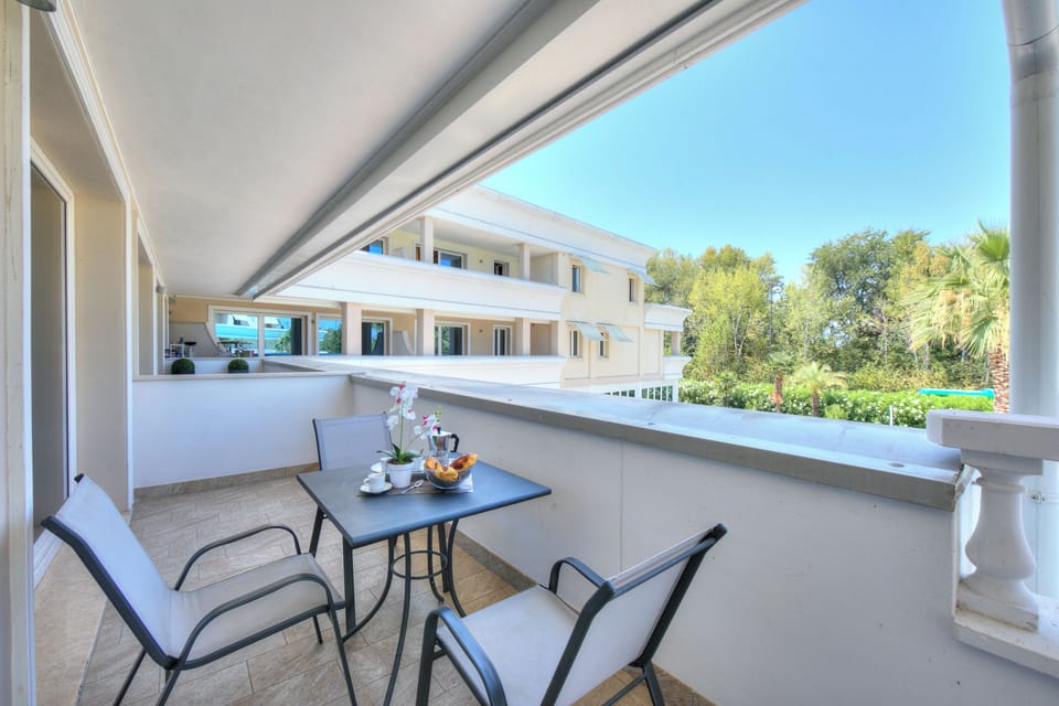 Family Apartment, 1 Bedroom, Balcony (Rivoltella Apt With Pool 600m From) | Outdoor dining