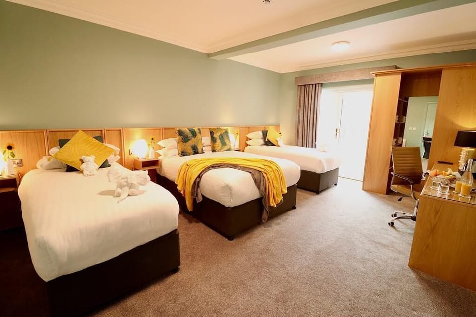 Family Room | Hypo-allergenic bedding, in-room safe, desk, iron/ironing board