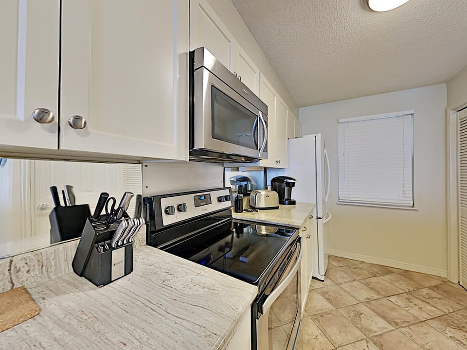 Condo, Multiple Beds, Balcony, Ocean View (#A805 - No Pets) | Private kitchen | Fridge, microwave, oven, dishwasher