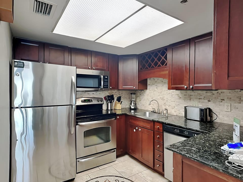 Condo, Multiple Beds, Balcony, Ocean View (#1127 - No Pets) | Private kitchen | Fridge, microwave, oven, stovetop