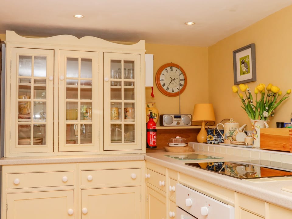 Fridge, electric kettle, toaster, cookware/dishes/utensils