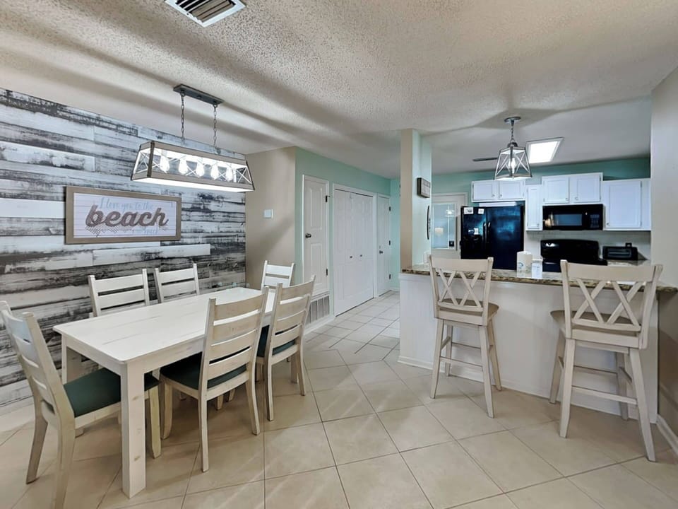 Condo, Multiple Beds, Balcony, Pool View (#5 - No Pets) | Dining