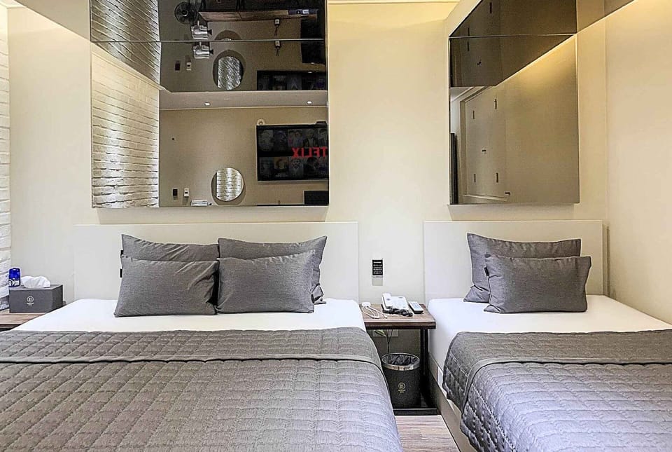 Premium Twin Room | Premium bedding, down comforters, memory foam beds, desk