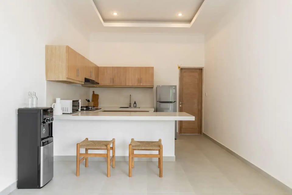 Deluxe Villa, 2 Bedrooms | Private kitchen | Coffee/tea maker, electric kettle, toaster, highchair