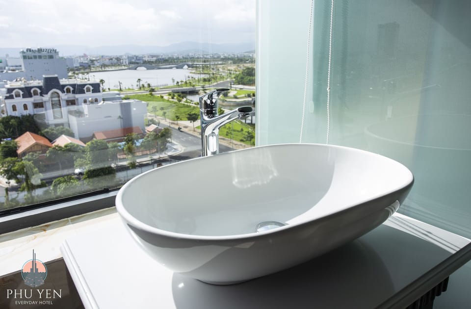Family Quadruple Room | Bathroom | Rainfall showerhead, designer toiletries, hair dryer, bathrobes