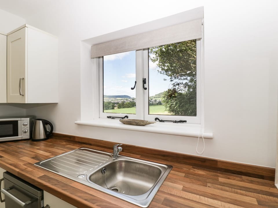 Fridge, dishwasher, electric kettle, cookware/dishes/utensils