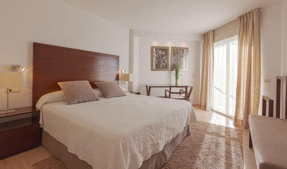In-room safe, blackout drapes, iron/ironing board, cribs (free)