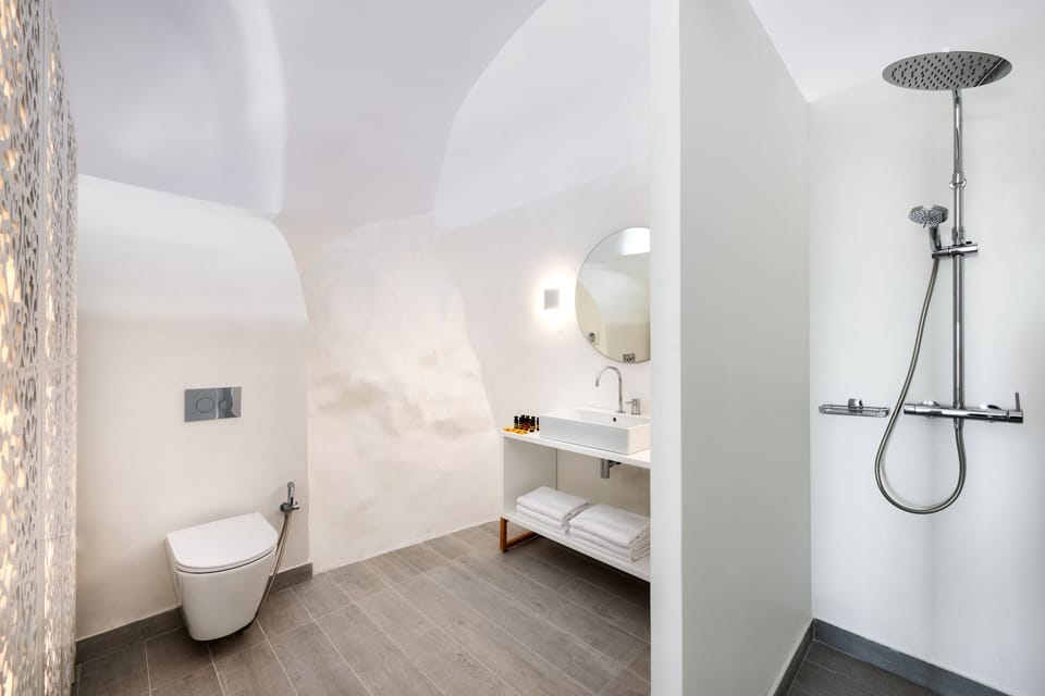 Junior Suite, Private Pool | Bathroom | Shower, hair dryer, bathrobes, slippers