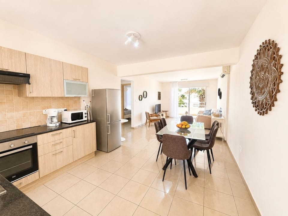 Comfort Apartment | Living area | TV