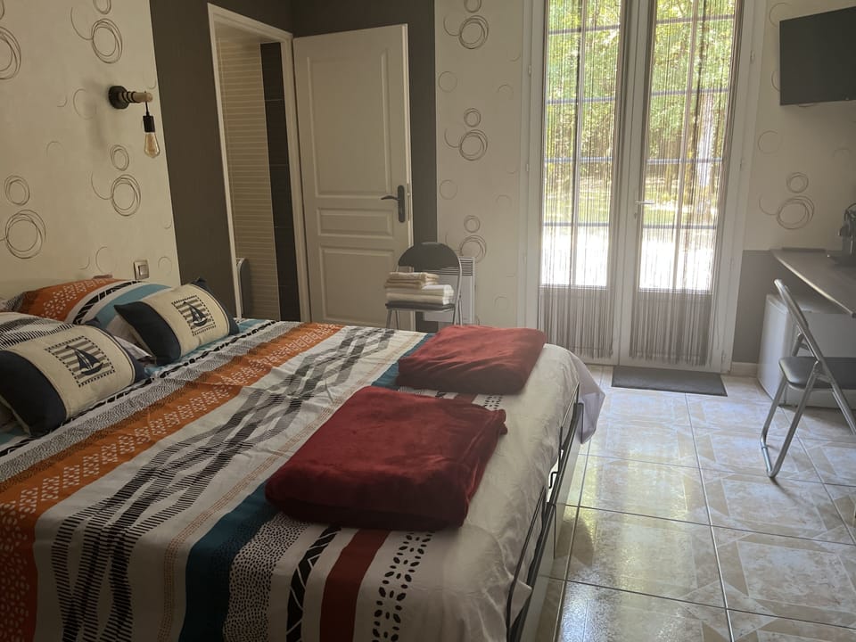 Panoramic Triple Room, 3 Bedrooms, Refrigerator, Garden View | Free WiFi, bed sheets
