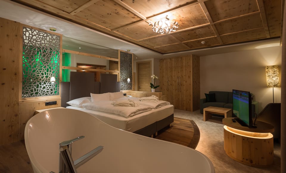 Superior Suite, Lake View, Lakeside | Minibar, in-room safe, desk, soundproofing