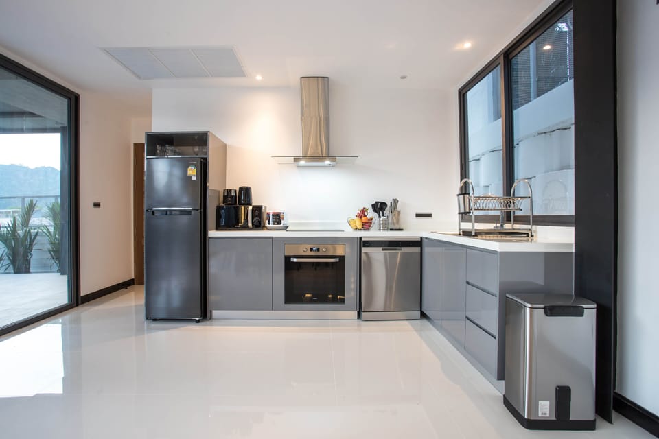 Luxury Villa | Private kitchen | Fridge, microwave, stovetop, dishwasher