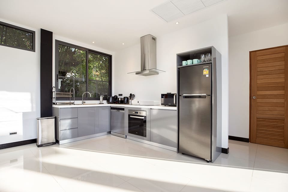 Luxury Villa | Private kitchen | Fridge, microwave, stovetop, dishwasher