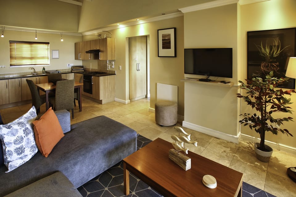 Classic Apartment | Living area | 39-inch LED TV with satellite channels, TV