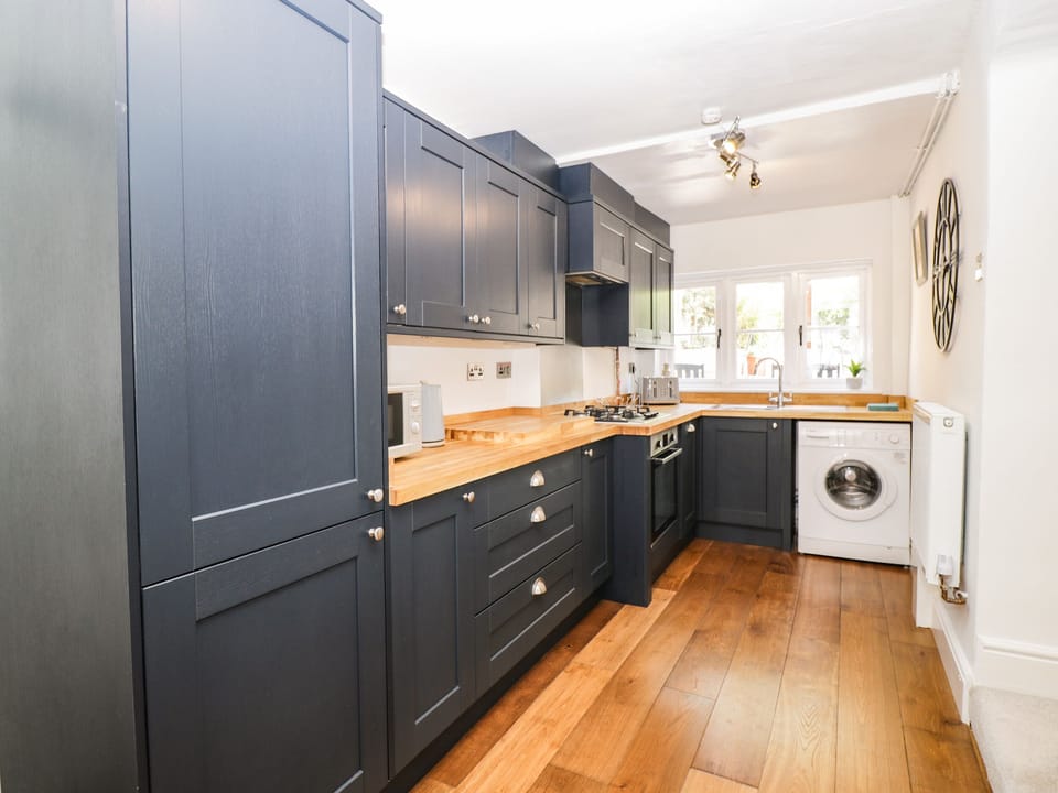 Fridge, dishwasher, electric kettle, cookware/dishes/utensils
