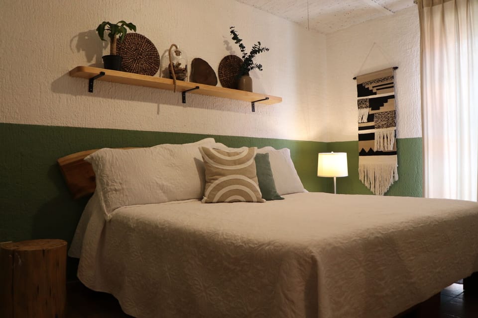 Premium bedding, down comforters, memory foam beds, laptop workspace