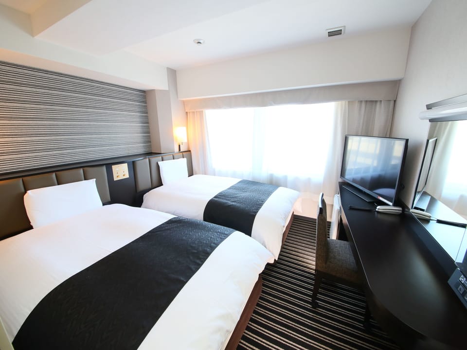 Premium bedding, down comforters, desk, blackout drapes