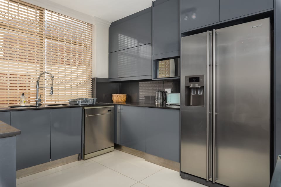 Luxury Apartment | Private kitchen | Fridge, microwave, oven, stovetop