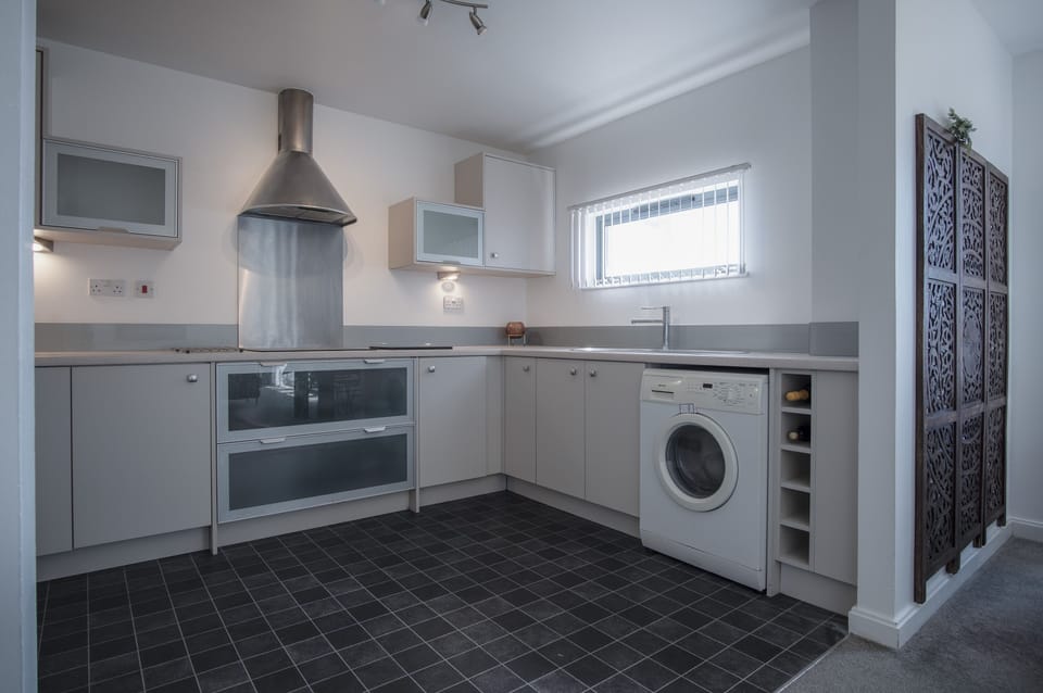 Exclusive Apartment | Private kitchen | Full-size fridge, microwave, oven, stovetop