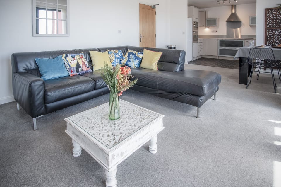 Exclusive Apartment | Living area | 50-inch Smart TV with digital channels, TV, streaming services
