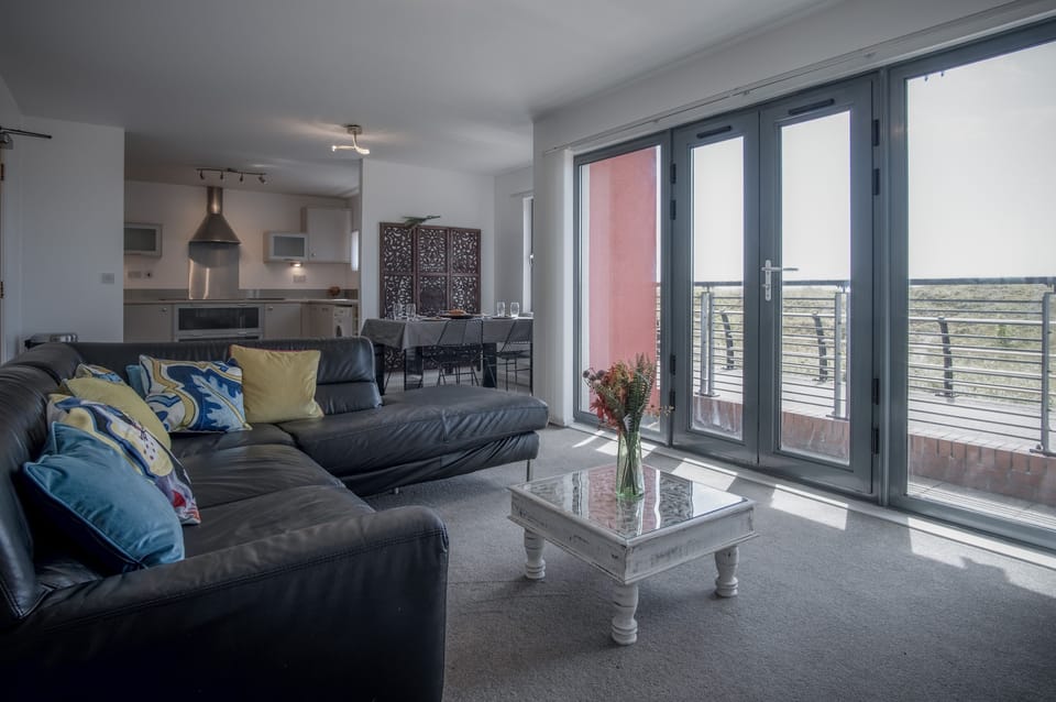 Exclusive Apartment | Living area | 50-inch Smart TV with digital channels, TV, streaming services