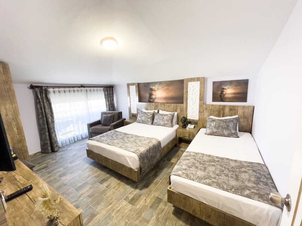 Standard Room, Multiple Beds | Egyptian cotton sheets, premium bedding, laptop workspace