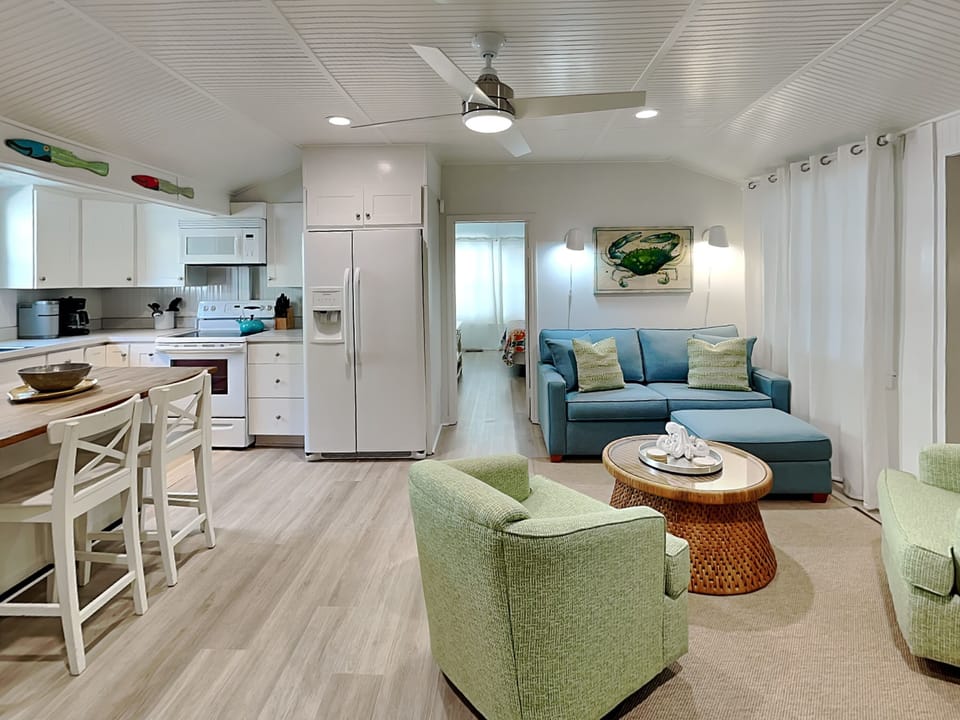 House, Multiple Beds, Pool Access, Pool View | Living area | 40-inch TV with digital channels