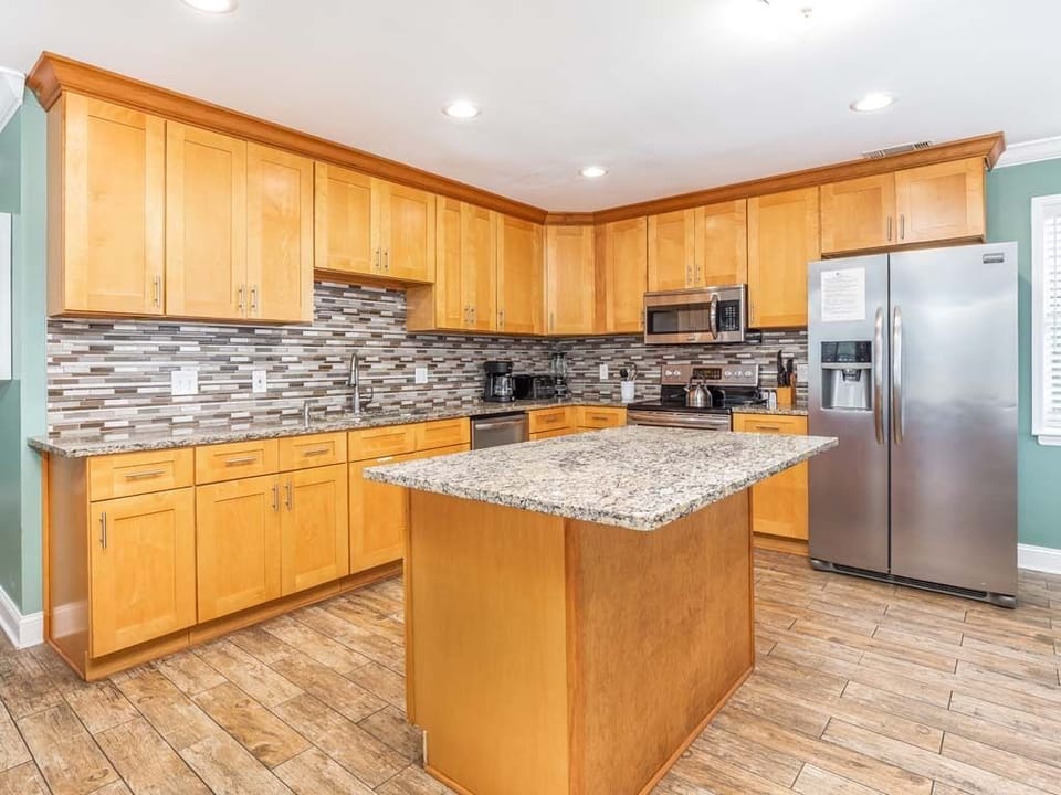 Condo, Multiple Beds, Kitchen, Partial Ocean View | Private kitchen | Fridge, microwave, oven, stovetop