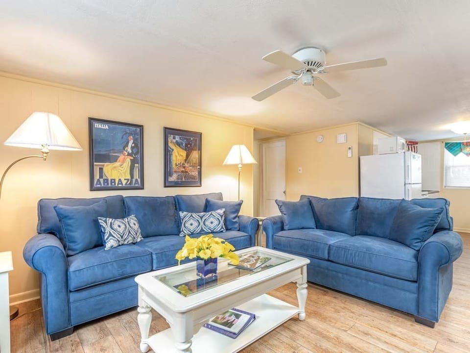 Condo, 1 Queen Bed, Kitchen, Garden View | Living area | 50-inch flat-screen TV with digital channels